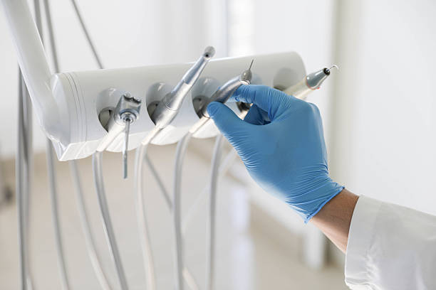 Professional Tooth Extraction technician working in Sibley, LA
